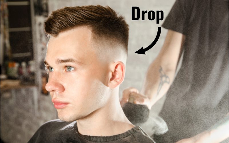 Voor een stuk over drop fades, een kromme pijl die wijst naar de drop in de fade