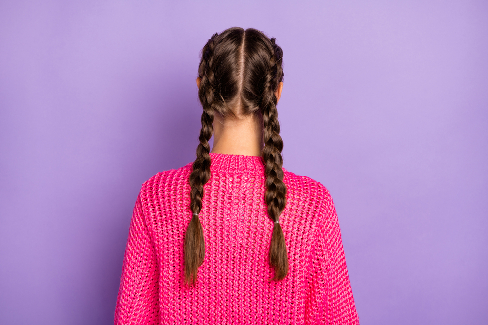 Darling Double Braids op een Mexicaanse vrouw gezien vanaf de achterkant