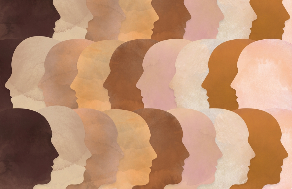 Verschillende huidtinten (voor een stuk over haarkleuren voor warme huidtinten) in een grafische afbeelding met mensen op alle delen van de schaal