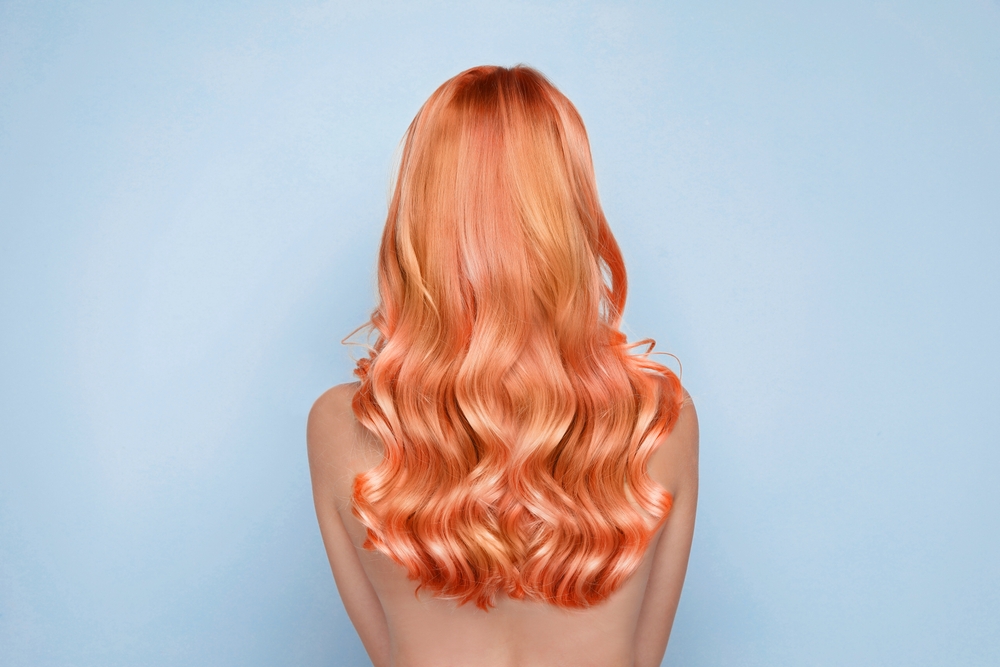 Blonde Meloen Lange Krullen oranje haarkleur idee