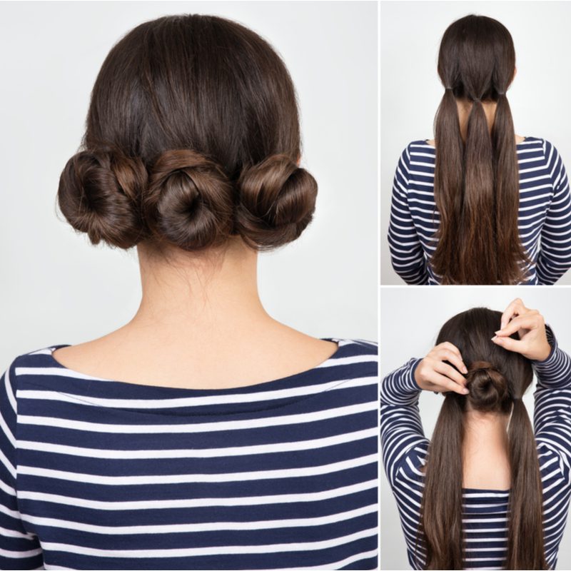 Triple Bun Easy Updo op een vrouw in een blauw en wit gestreept shirt met lange mouwen.