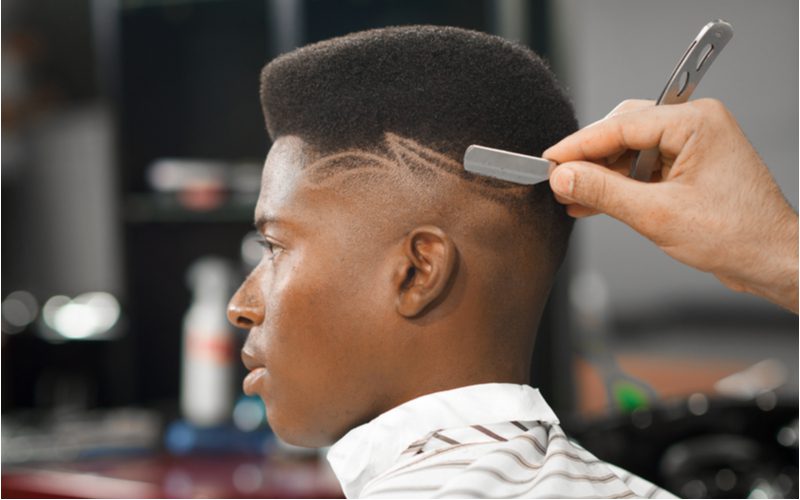 Mid Skin Fade Met Geschoren Ontwerpen