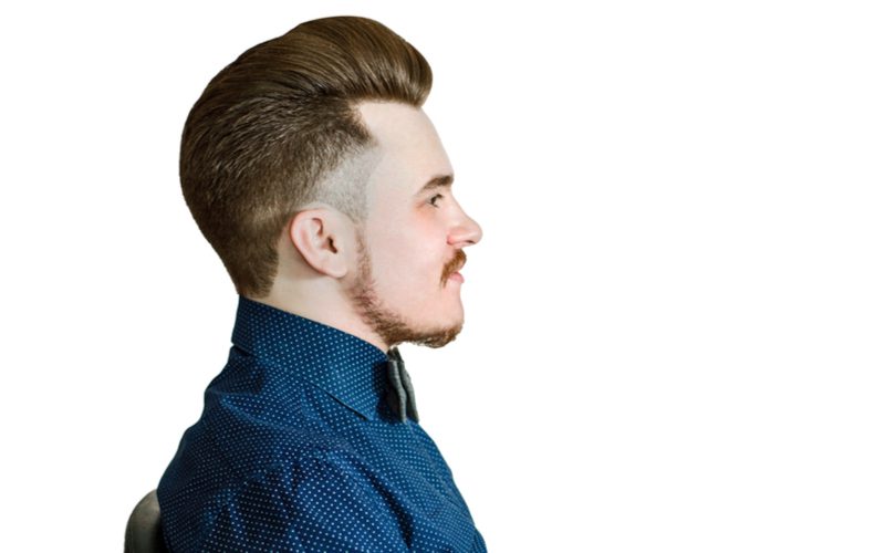 Side-Swept Pomp met Burst Fade