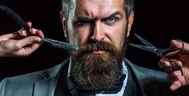 Straight Razor and Scissors Around Bearded Man's Face