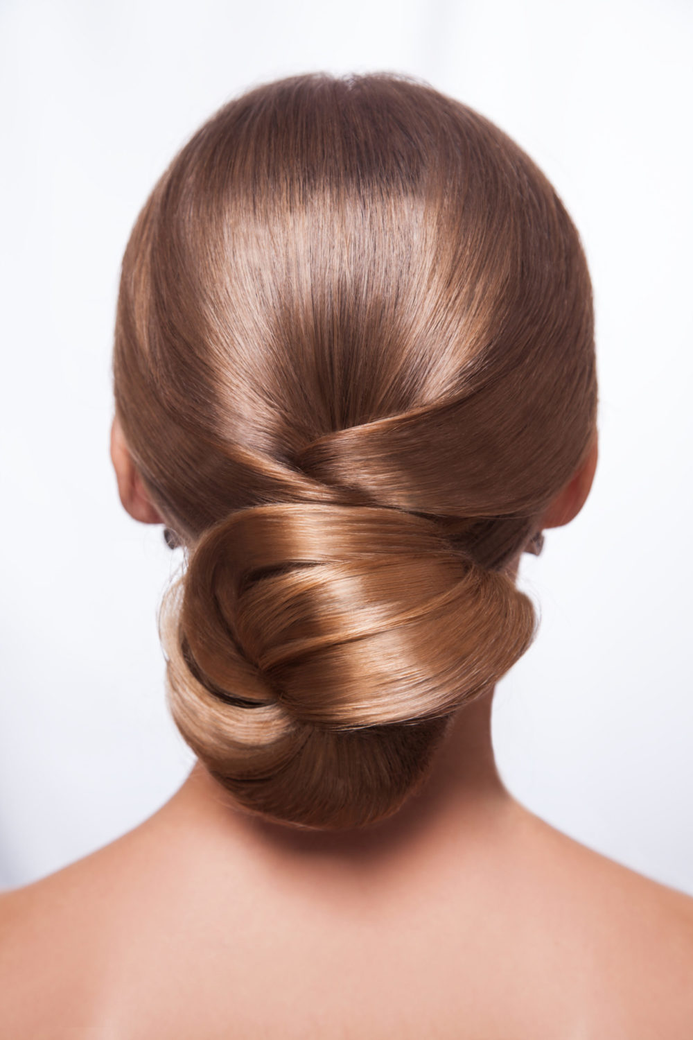 Chique geknoopte chignon, een geweldig moederkapsel.