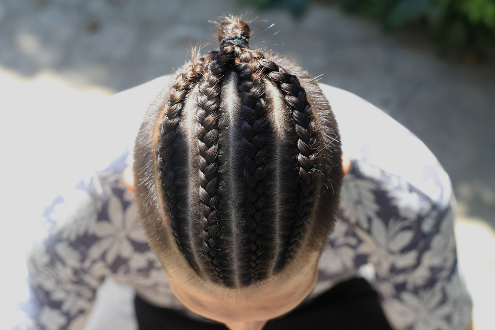 Undercut Medium Braids With Man Bun voor een roundup van blanke mannen vlechten